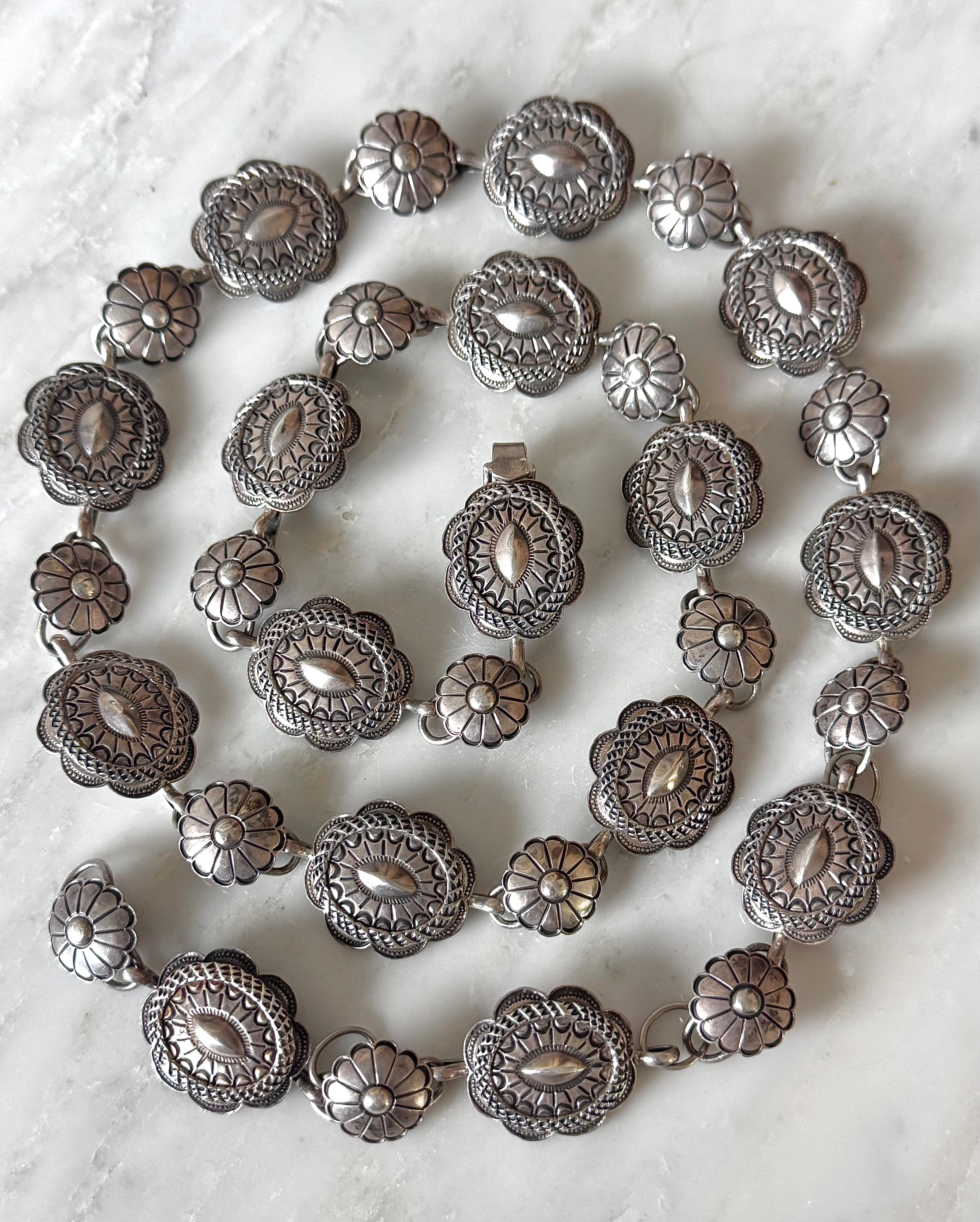 Navajo Handmade Sterling Concho Belt