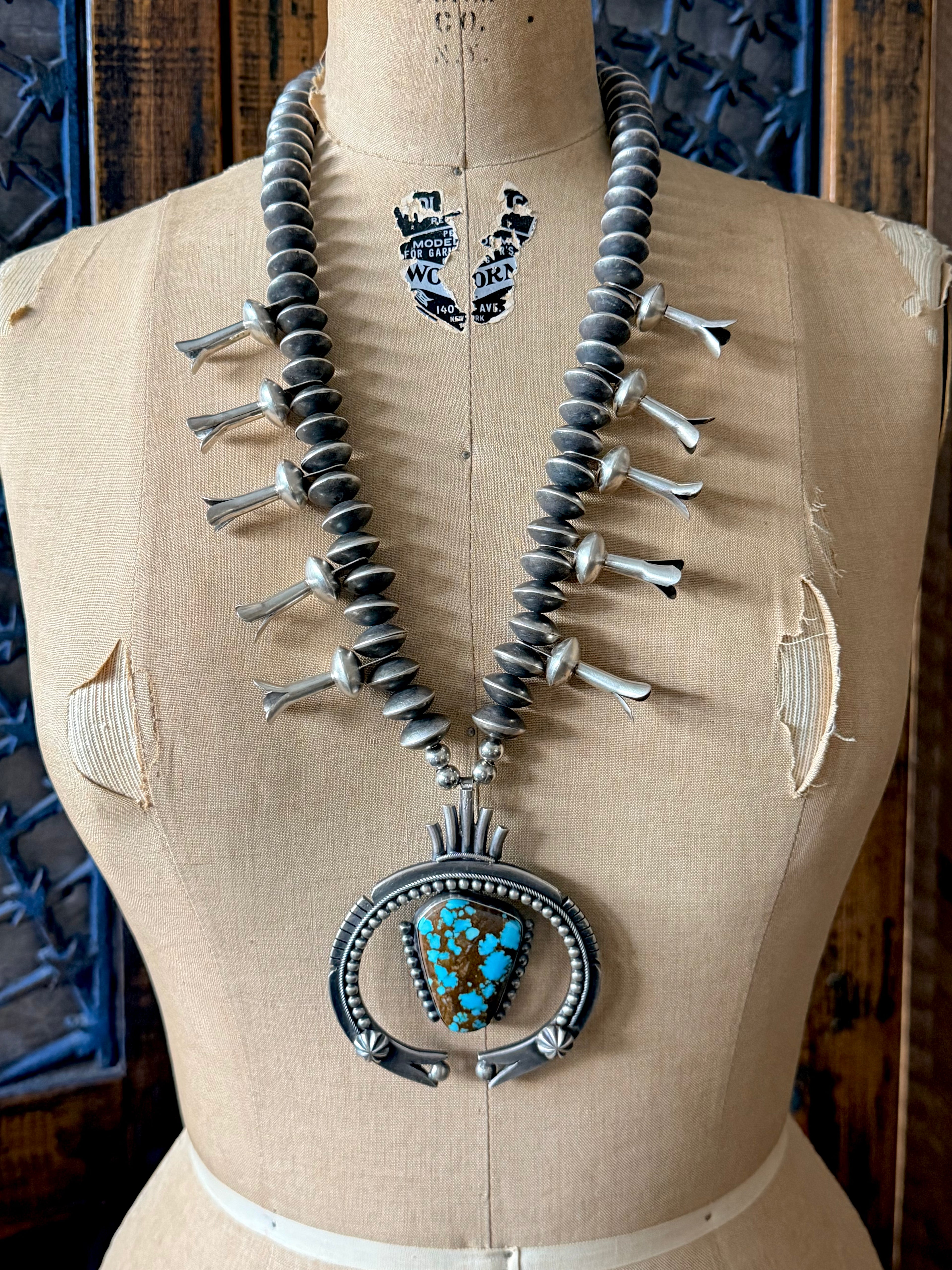 ColoradoJo Andy Marion Pilot Mountain Turquoise & Sterling Squash Blossom Necklace on mannequin
