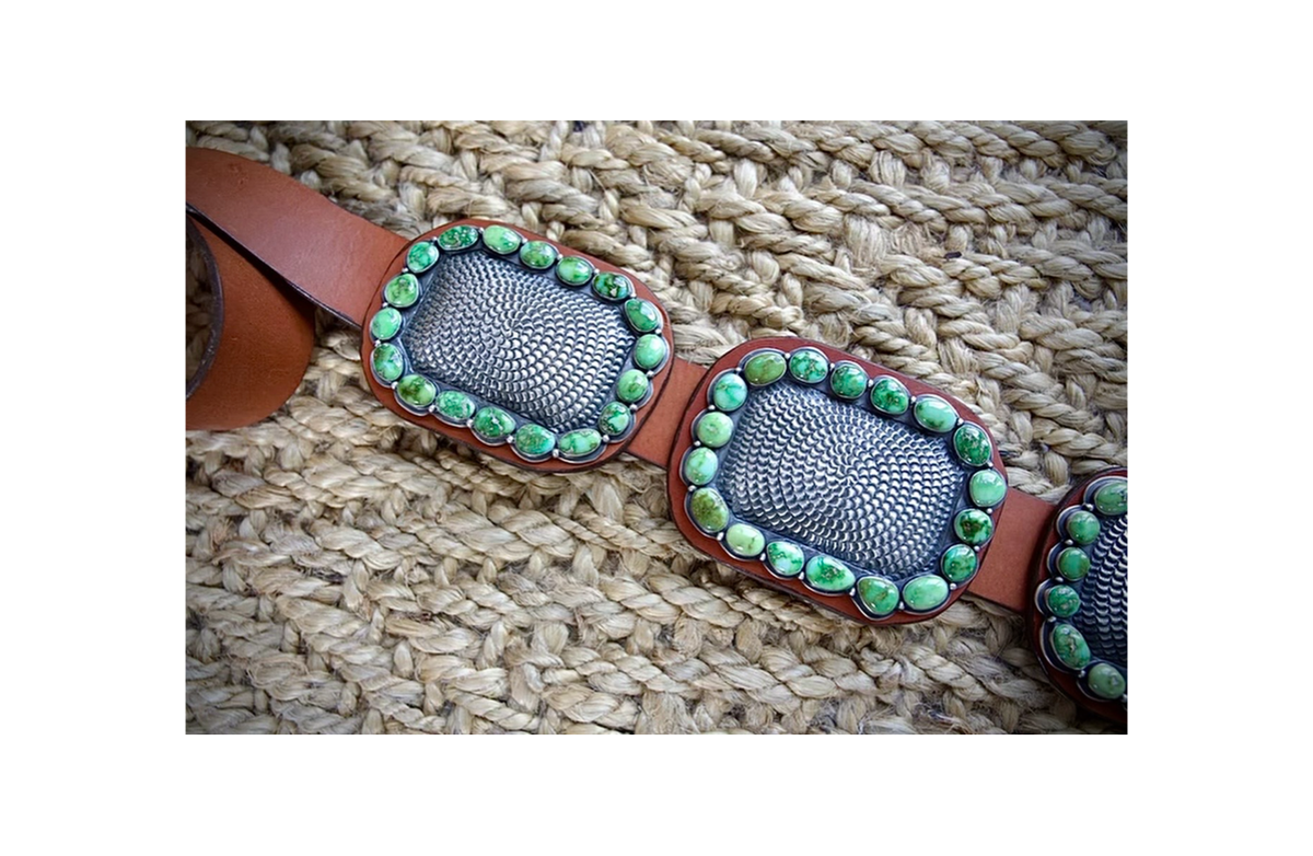 ColoradoJo featuring Collectible Artist Matthew Charley Concho Belt with Sonoran Gold Turquoise and hand stamping displayed on brown leather 