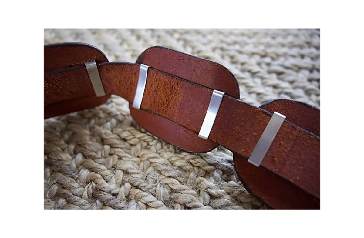 ColoradoJo featuring Collectible Artist Matthew Charley Concho Belt on brown leather concho backings view