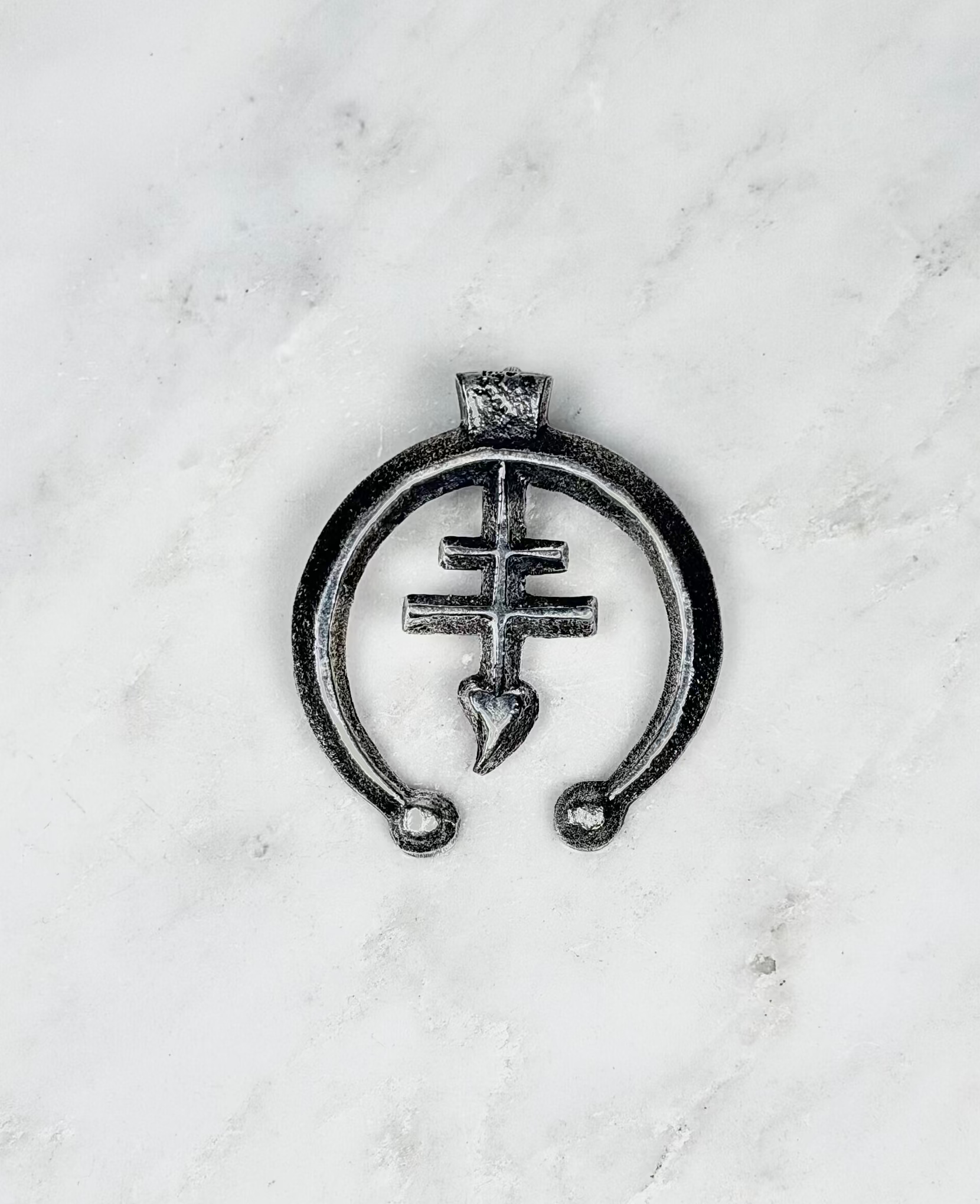ColoradoJo Tufa Cast Naja pendant by Gary Custer front view